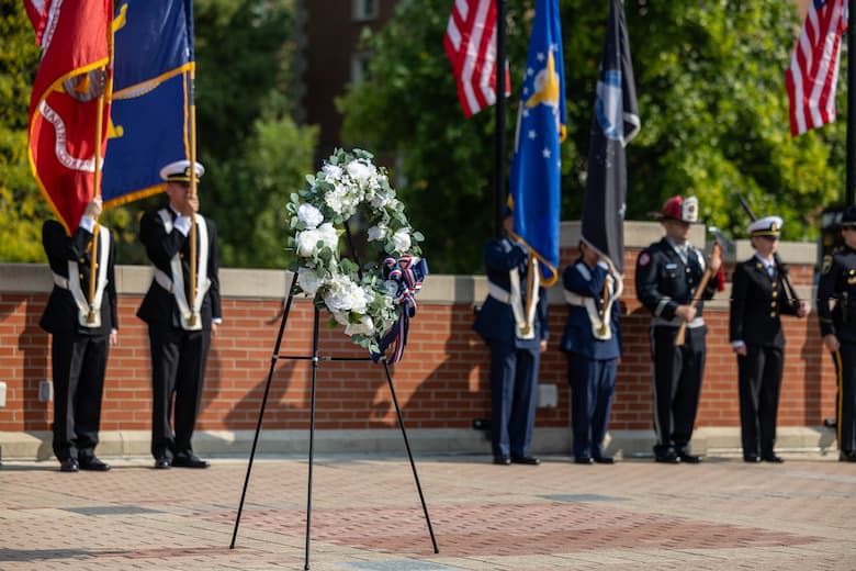  Patriot Day Wreath on Traditions Plaza Stage with color guard in background