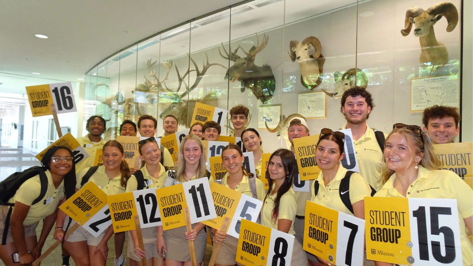  Group of Summer Welcome Leaders Holding Student Group Signs